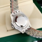 Rolex GMT-Master series, black dial, red and blue bezel, 40mm, silver five-link bracelet.