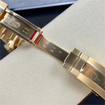 Rolex Submariner, blue dial, blue bezel, 40mm, gold Oyster bracelet.