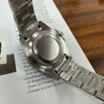 Submariner series, green dial, green bezel, 41mm, silver Oyster bracelet.