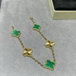 Four-leaf clover gold-interspersed green floral bracelet