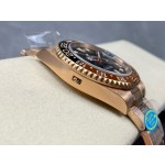 Rolex GMT-Master series, black dial, black and red bezel, 40mm, rose gold Oyster bracelet.