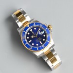 Greenwich series, blue dial, blue bezel, 40 mm, silver and gold Oyster bracelet.