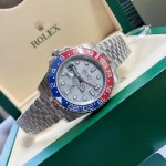 Greenwich series, meteorite-colored dial, blue and red bezel, 40mm, silver five-link bracelet.