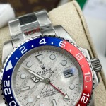 Greenwich series watch with meteorite-patterned dial, blue and red bezel, 40mm, and silver Oyster bracelet.