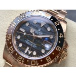 Greenwich series watch with tiger's eye dial, black and red bezel, 40mm case, and rose gold Oyster bracelet.