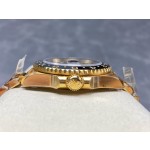 Greenwich series watch with tiger's eye dial, black bezel, and 40mm gold five-link bracelet.