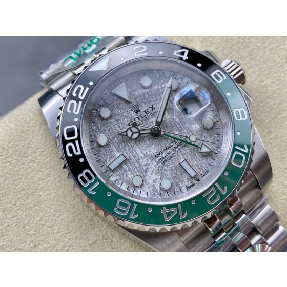 Greenwich series watch with meteorite-patterned dial, black and green bezel, 40mm case, and silver five-link bracelet.