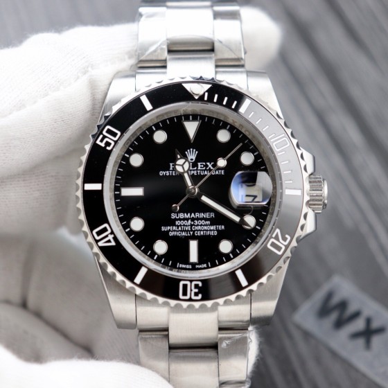 Rolex Submariner series, black dial, black bezel, 40mm, silver Oyster bracelet.