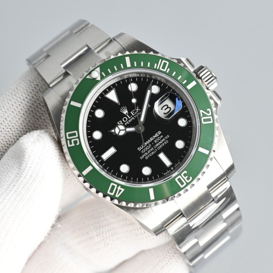 Rolex Submariner series, black dial, green bezel, 41mm, silver Oyster bracelet.