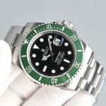 Rolex Submariner series, black dial, green bezel, 41mm, silver Oyster bracelet.