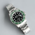 Rolex Submariner series, black dial, green bezel, 41mm, silver Oyster bracelet.