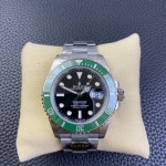 Rolex Submariner series, black dial, green bezel, 40mm, silver Oyster bracelet.