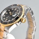 Rolex Submariner series, black dial, black bezel, 40mm, silver and gold Oyster bracelet.