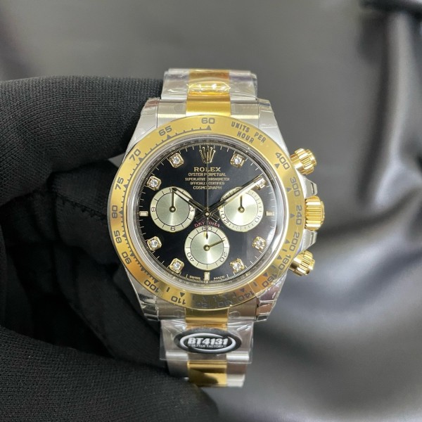 Rolex Daytona series, diamond-set black dial, gold bezel, silver case, 40mm, gold and silver Oyster bracelet.