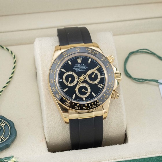 Rolex Daytona series, black dial, black bezel, gold case, 40mm, rubber strap.