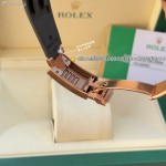 Rolex Daytona series with diamond-set black dial, black bezel, rose gold case, 40mm, rubber strap.