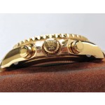 Rolex Yacht-Master series, white dial, blue bezel, gold case, 44mm, gold Oyster bracelet.