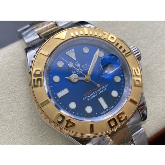 Rolex Yacht-Master series, blue dial, gold bezel, silver case, 44mm, two-tone Oyster bracelet.