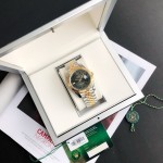 Datejust series men's watch, dark gray dial, gold bezel, 41mm, two-tone five-link bracelet.