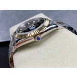 Datejust series men's watch, diamond-set black dial, gold bezel, 41mm, two-tone Oyster bracelet.