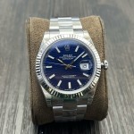 Log series men's watch, wave pattern blue dial, silver bezel, 41mm, silver Oyster bracelet.