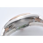 Datejust series men's and women's watch with diamond accents, pink dial, gold bezel, 41mm, two-tone Oyster bracelet.