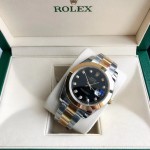 Datejust series men's watch, diamond-set black dial, gold bezel, 41mm, two-tone Oyster bracelet.
