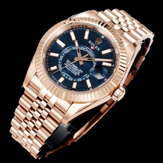 Navigator series men's watch, blue-green dial, rose gold bezel, 42mm, rose gold five-link bracelet.