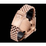 Navigator series men's watch, blue-green dial, rose gold bezel, 42mm, rose gold five-link bracelet.