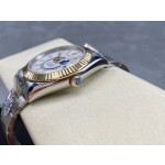 Navigator series men's watch, white dial, gold bezel, 42mm, two-tone Oyster bracelet.