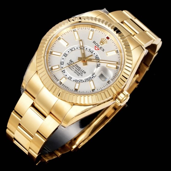 Navigator series men's watch, white dial, gold bezel, 42mm, gold Oyster bracelet.