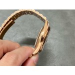 Sunday date display series men's watch, chocolate dial, rose gold bezel, 40mm, rose gold President-style bracelet.
