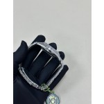 Sunday calendar series men's watch with full diamond dial and diamond-set bezel, 41mm, silver President-style bracelet.