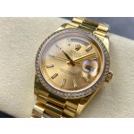 Sunday Calendar series men's and women's watches, gold dial, diamond-set bezel, 36mm and 40mm sizes, gold President-style bracelet.