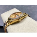 Sunday Calendar series men's and women's watches, gold dial, diamond-set bezel, 36mm and 40mm sizes, gold President-style bracelet.