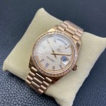 Sunday date display series women's watch, rose gold dial, diamond-set bezel, 36mm, rose gold President-style bracelet.