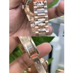 Sunday calendar series women's watch with diamonds, green dial, diamond-set bezel, 36mm, rose gold President-style bracelet.