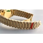 Sunday date display series women's watch with diamonds, gold dial, gold bezel, 36mm, gold President-style bracelet.