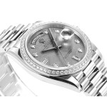Sunday calendar series women's watch with meteorite-colored dial, diamond-set bezel, 36mm, and silver President-style bracelet.