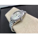 Sunday calendar series men's watch, silver dial, diamond-set bezel, 40mm, silver President-style bracelet.
