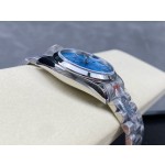 Sunday date display series women's watch, blue dial, silver bezel, 36mm, silver President-style bracelet.