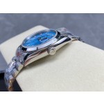 Sunday date display series women's watch, blue dial, silver bezel, 36mm, silver President-style bracelet.