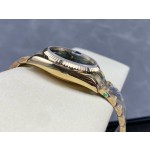 Sunday date display series women's watch with gradient green dial, gold bezel, 36mm case, and gold President-style bracelet.