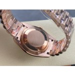 Sunday date display series women's watch, blue dial, rose gold bezel, 36mm, rose gold President-style bracelet.