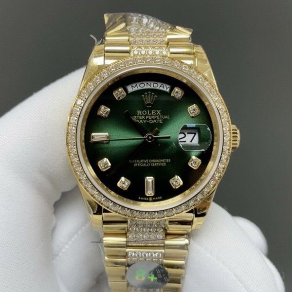 Sunday date display series women's watch, green dial, diamond-set bezel, 36mm, with diamond-set gold President-style bracelet.