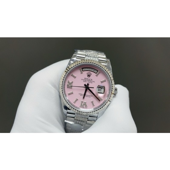 Sunday Calendar series women's watch, pink dial, silver bezel, 36mm, with diamond-set silver President-style bracelet.