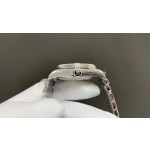 Sunday Calendar series women's watch, pink dial, silver bezel, 36mm, with diamond-set silver President-style bracelet.