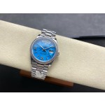 Sunday Calendar series women's watch, turquoise dial, diamond-set bezel, 36mm, silver President-style bracelet.