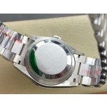 Sunday Calendar series women's watch, turquoise dial, diamond-set bezel, 36mm, silver President-style bracelet.