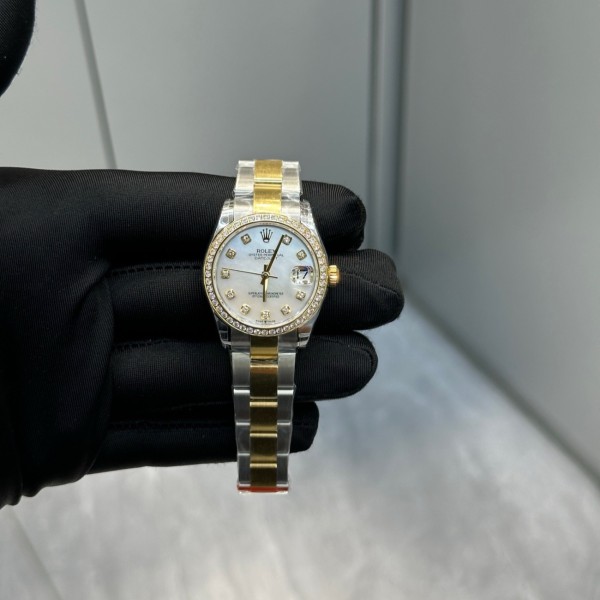 Datejust series, 31mm mother-of-pearl dial with diamonds, two-tone gold and silver strap.